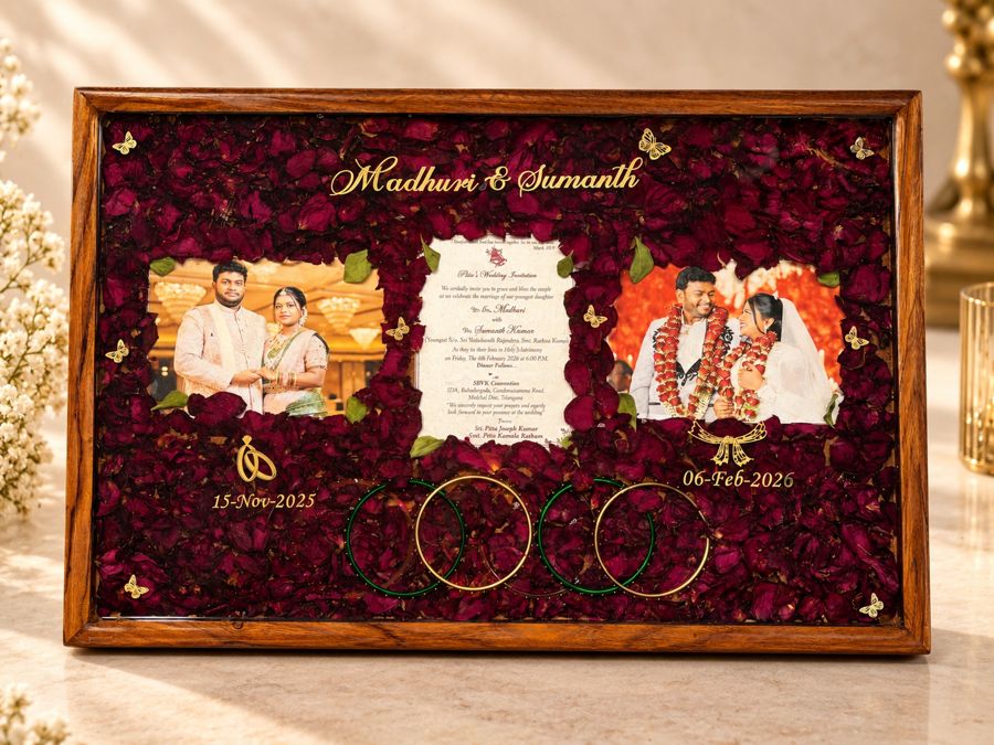 Wedding invitation and photos framed with preserved petals